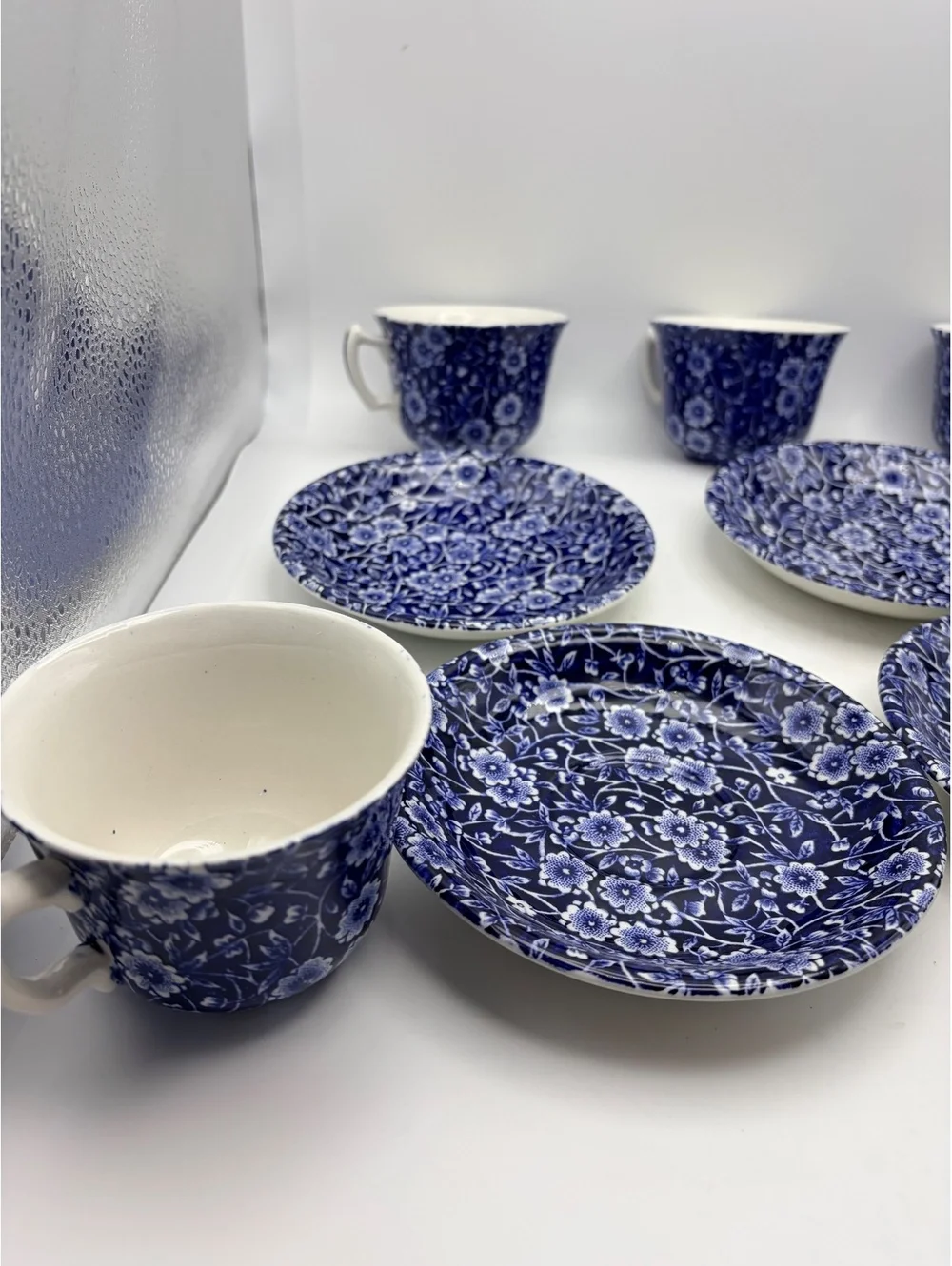 5 vintage sets of cups and saucers. Blue on white 1968 England.